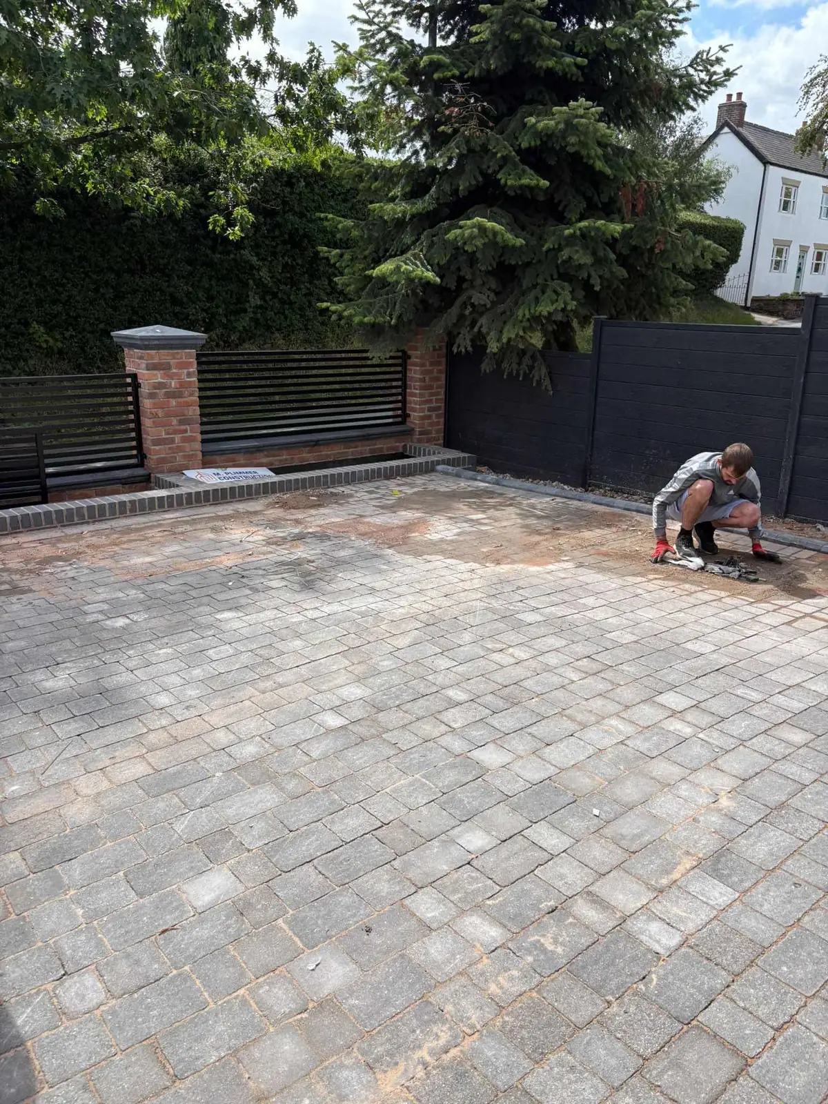 The same driveway cleared, swept and handed back spotless